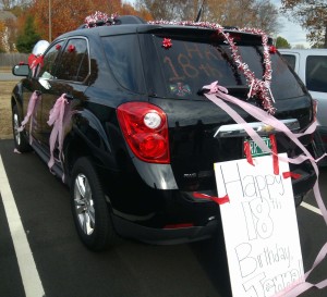 SENIOR JENNA BARNUM is surprised to see her car decorated on her 18th birthday.