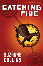 CATCHING FIRE by Suzanne Collins.