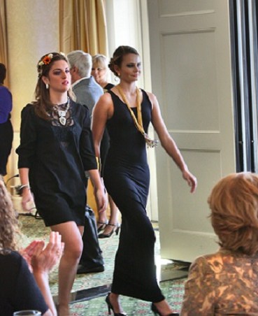 SOPHOMORES HALEY BALDWIN and Haley Henahan strut during the school's fashion show.