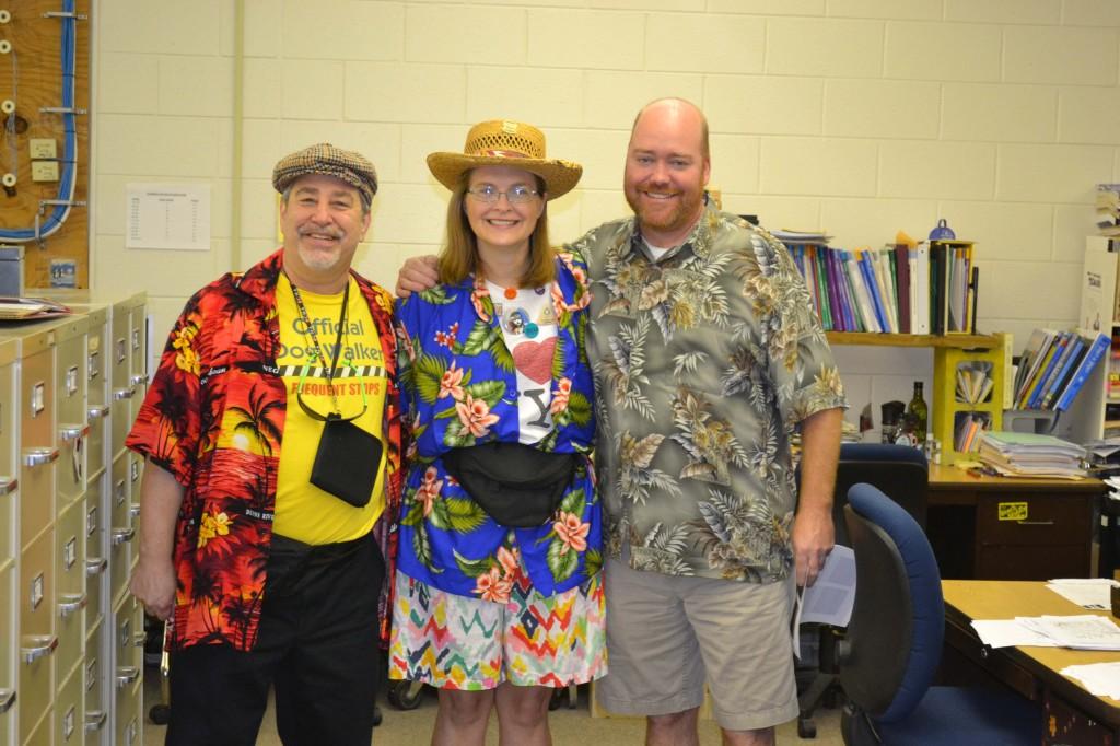 LARRY BECKER, SHAULA MCGOVERN, AND ERIC BODENSTEIN celebrate this year's Tacky Tourist spirit day.