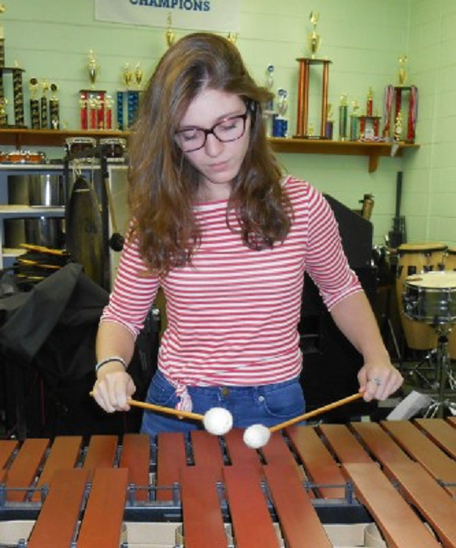 JUNIOR CELESTE FINELLI practices the xylophone in preparation for the Winter Band Concert. 