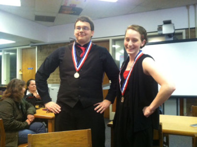 SENIORS MIRANDA FYFE and Curtis Humm pose with their medals after taking first place in the Forensics State tournament recently.