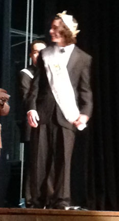 SENIOR CARTER DAVIS wins Mr.Cox 2014 and celebrates with his fellow classmates.