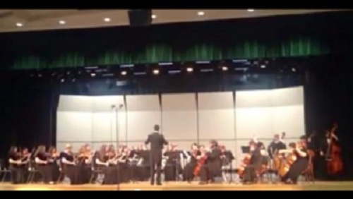 LED BY ORCHESTRA teacher Aaron Hardwick, the schools orchestra performs at the District Orchestra Festival.