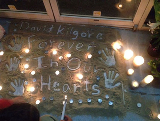 THE COMMUNITY GATHERS to remember Beach Pharmacy owner and Cox alum parent David Kilgore.