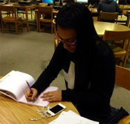 JUNIOR ANGELINA GARZA prepares for an upcoming test in the library.