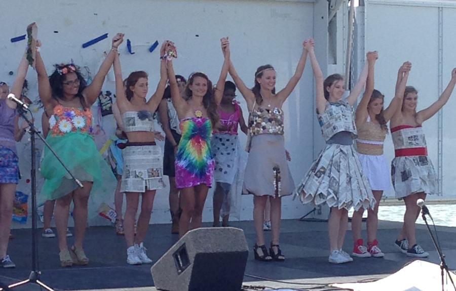 FASHION MARKETING STUDENTS show off their trashion at Mt. Trashmores Earth Day celebration recently.