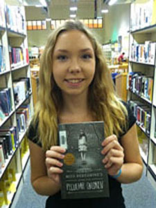 JUNIOR MEGAN WILLIAMS chose the novel Miss Peregrines Home for Peculiar Children by Ransom Riggs for her first read of the school year. 