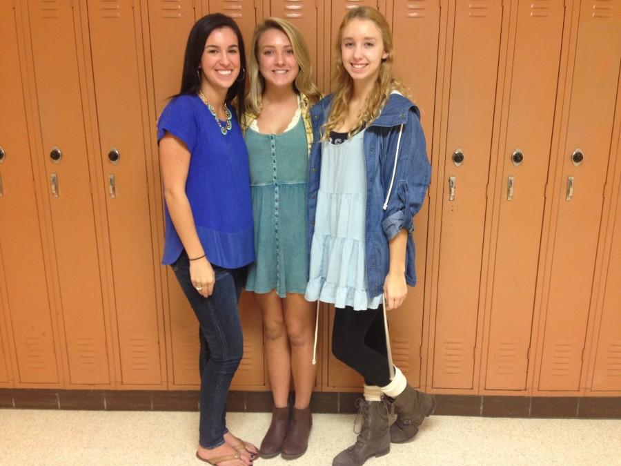 JUNIORS CLAYBORNE LOIZOU, Angie Soleman, and sophomore Ava Stewart strut their fall fashion style.