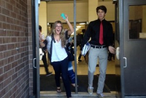 SENIORS SARAH MOORE and Brett Rosenmier take advantage of their early departure from school.