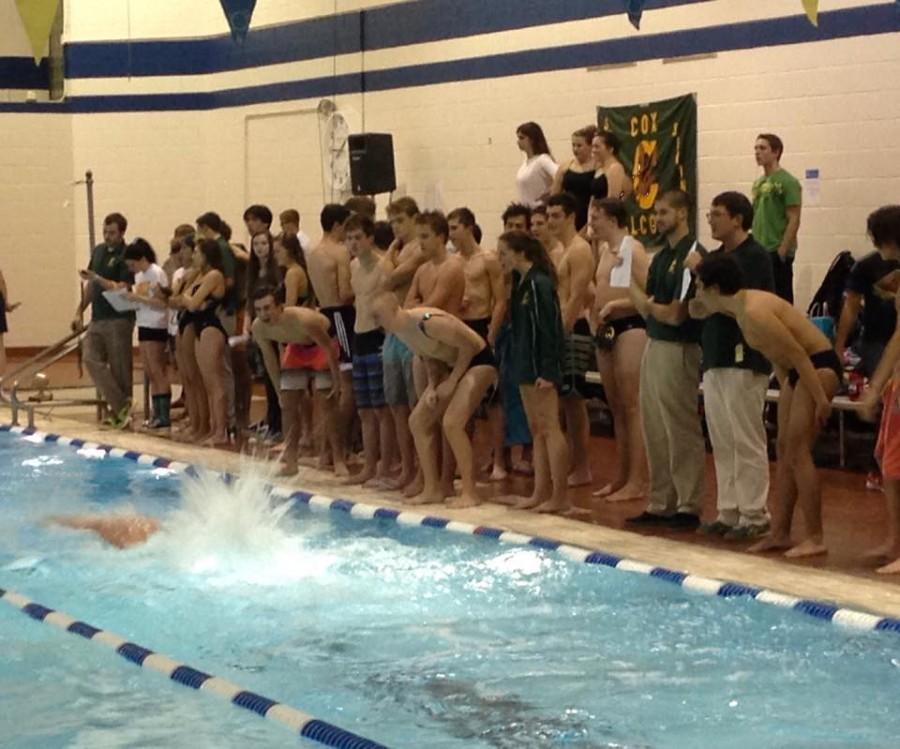 BOYS+%26+GIRLS+SWIM+and+Dive+team+cheer+on+their+teammates+in+the+meet+against+First+Colonial.