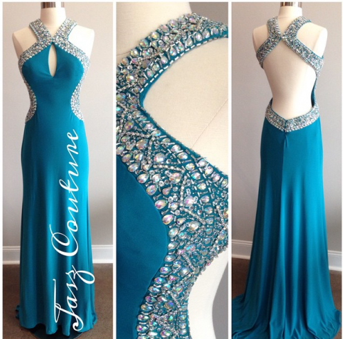 ONLINE FORMALS SHARED their open back, sequined gown. 
