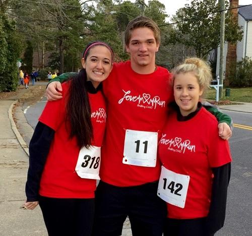 SENIORS RAYNA TRINADAD, Chris Altekruse, and Lauren Harris pose for a picture before they run 3 miles!