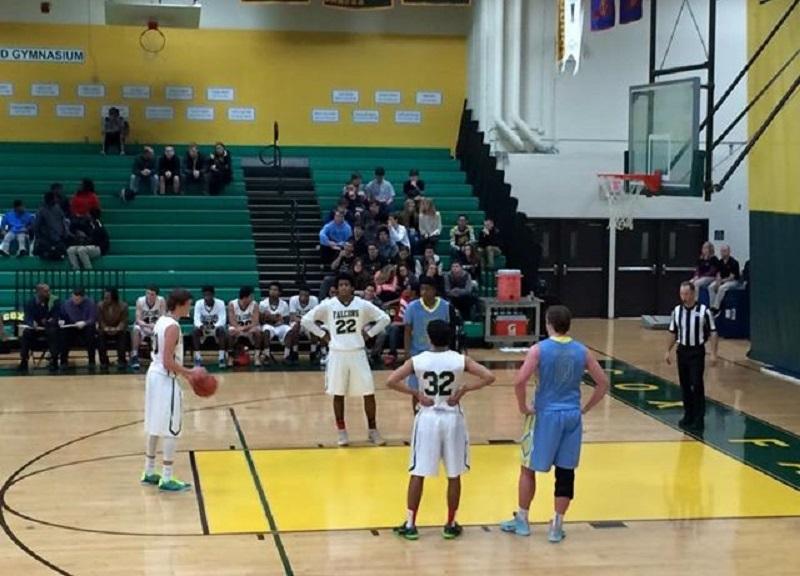 JUNIOR COLE JOHNSON takes a free throw at the Boys Varsity Basketball game against First Colonial.