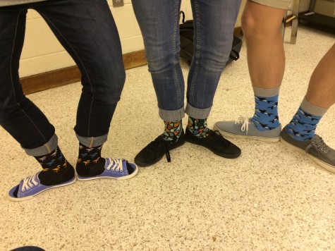 STUDENTS SHOW OFF their crazy shoes and socks for spirit week.