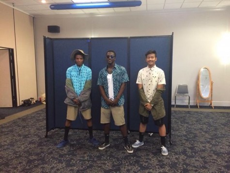 SENIORS JAVON MARCELLE, Leondis Griffin, and Time Sang participate in the Zonta Fashion Show.