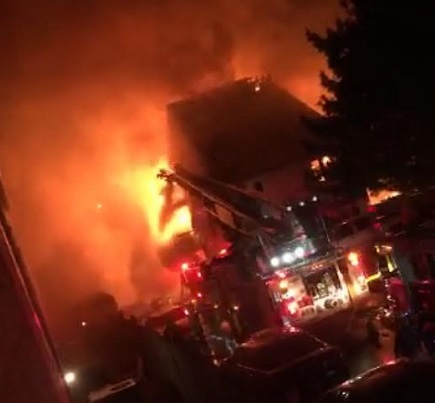 FIRE RAGES THROUGH Shore Drive  condominiums, destroying two buildings.