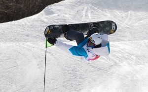 SENIOR RYAN BOZEMAN soars through the air during his competition.