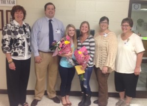 SENIORS JESSIE-KATE Parker and Lexi Pace pose with Dr. Riesbeck and teachers Kyle Goodson, Deb Erskine, and Kim Peterson.