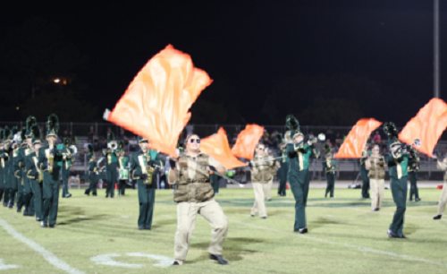 THE MARCHING FALCONS took the field at halftime during the Cox - Kellam football game.
