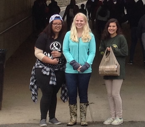 FCCLA STUDENTS ANDREI Kabigting, Brittany Carroll, and Catalina Harmon huddled together at the state fair entrance.