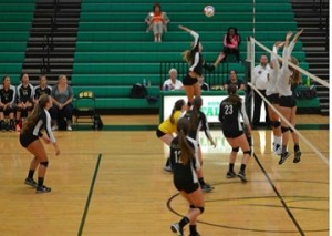 FRESHMAN VOLLEYBALL PLAYER Gracie Johnson goes up for the kill.