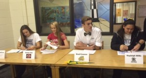 SENIORS (L-R) GEORGIA DACRUZ, Darby Cole, Brad Creamer, and Kayleigh Willis sign their Letters of Intent.