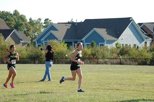SOPHOMORE HOPE SANDLIN runs her way to the finish line.