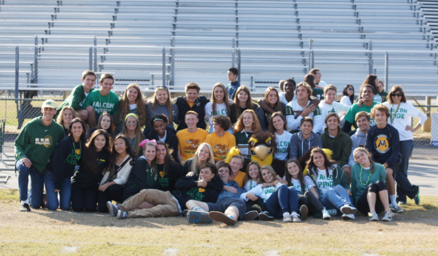 THIS YEARS SCA Executive Board poses for a group photo on the football field.