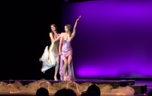 SENIORS LAUREN MCGOVERN and Haley Henahan strut their stuff on stage at Kellam High School.