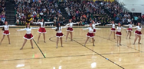 THE COQUETTES PERFORM their holiday routine at the winter pep rally.
