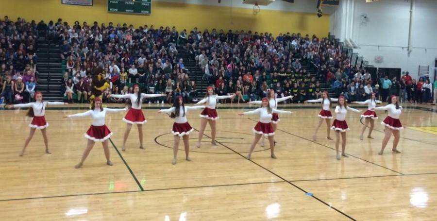 THE COQUETTES PERFORM their holiday routine at the winter pep rally.