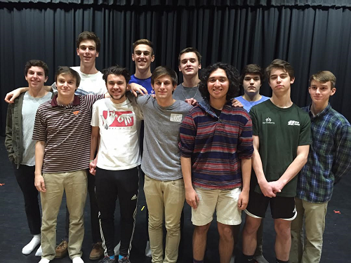 MR. COX CONTESTANTS smile big for the camera during practice.