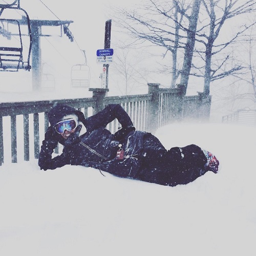 SKYLAR MAIHLES POSES in the snow.