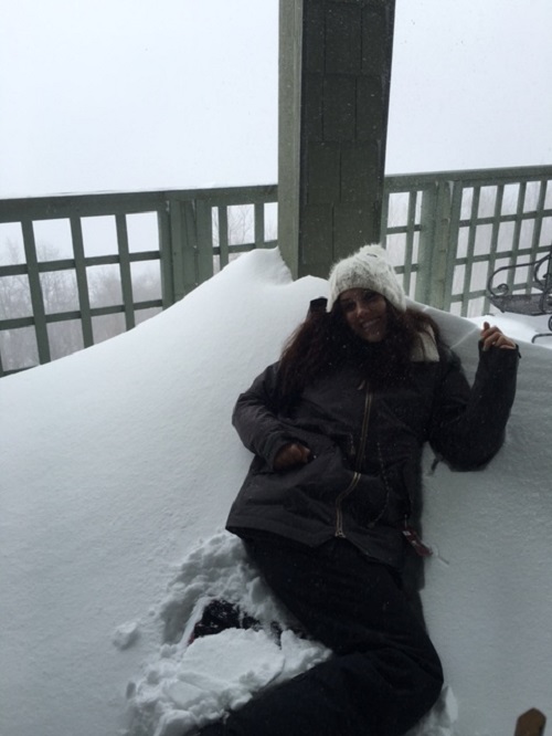 SKYLAR MAIHLES ENJOYS laying in snow during her stay at Snowshoe.