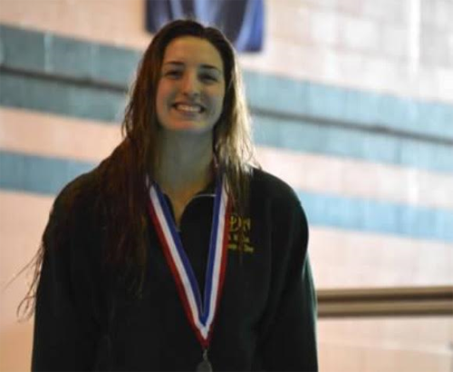 SENIOR GEORGIA DACRUZ takes home a medal at the conference competition.