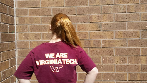 STUDENTS WEAR AN assortment of fan wear in support of their favorite college