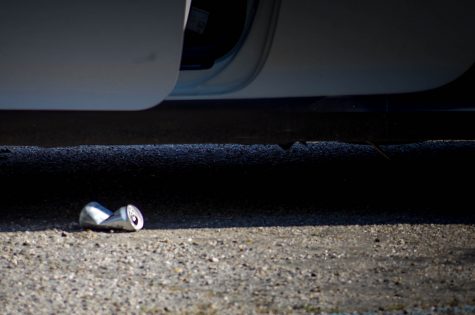 CANS FALL FROM the drunk drivers vehicle at the beginning of the "Every 15 Minutes" program.