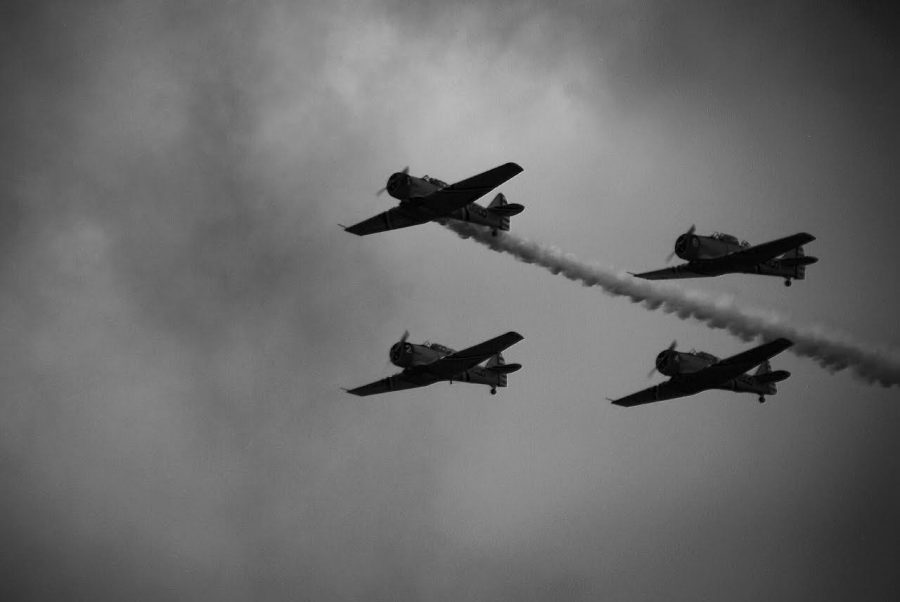 FOUR PLANES FLY in unison. 