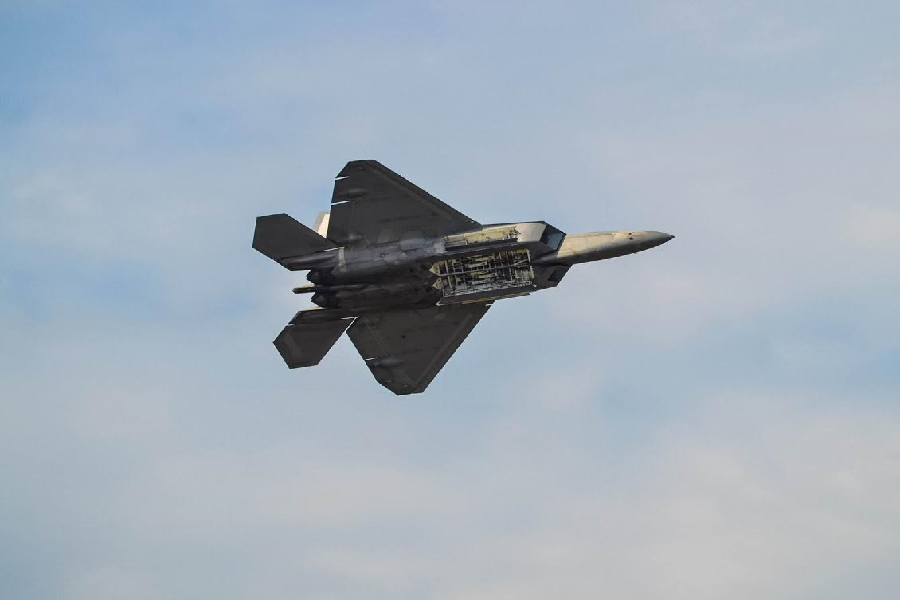 AN F-22 RAPTOR displays its flying capabilities
