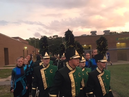 FLACON MARCHING BAND heads to the football field.