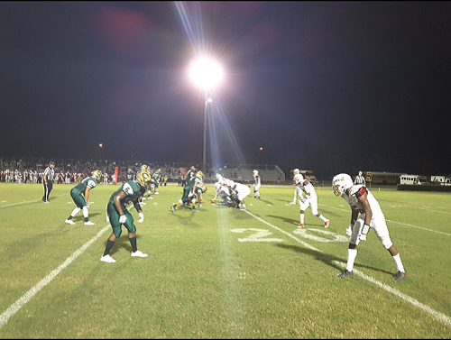 PLAYERS FACE OFF as Cox pushes Bayside back.