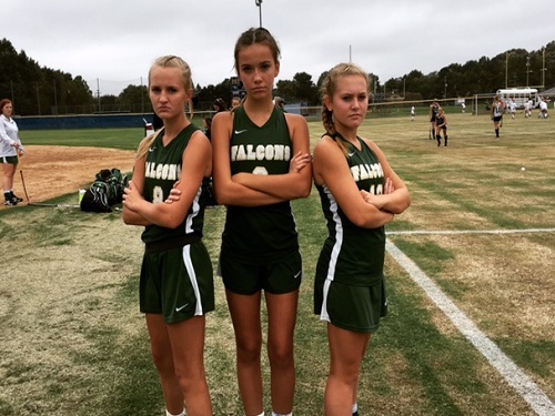 JV FIELD HOCKEY players (L-R) freshman Laine Hiller, Mia LaRusso, and sophomore Sydney Hillier leave it on the field against First Colonial High School.