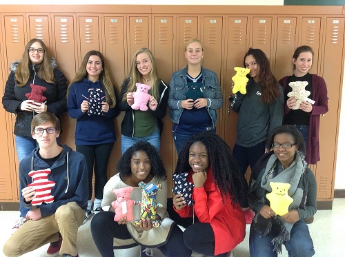 FCCLA STUDENTS SHOW off the bears they sewed for some of the younger patients at CHKD.