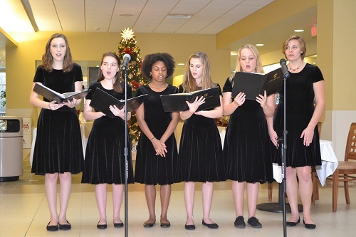 FALCON HARMONY CHORAL students perform for patients diagnosed with cancer recently at Sentara Virginia Beach General Hospital.