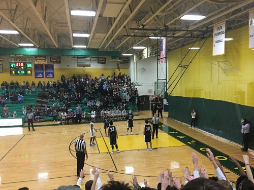 FANS CHEER ON the falcons during their game against First Colonial.