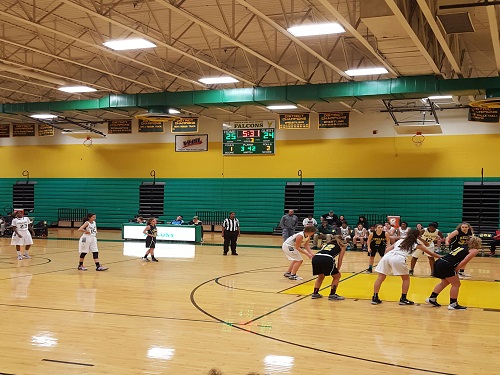 GIRLS VARSITY BASKETBALL takes on Kellam.