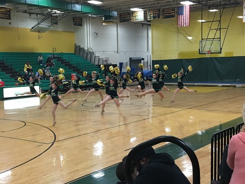 THE COQUETTES ENTERTAIN  the crowd at halftime.