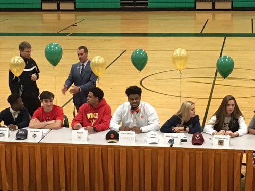 SENIORS SIGNED TO their [respective] colleges and universities yesterday at 1 p.m. in the schools gymnasium.