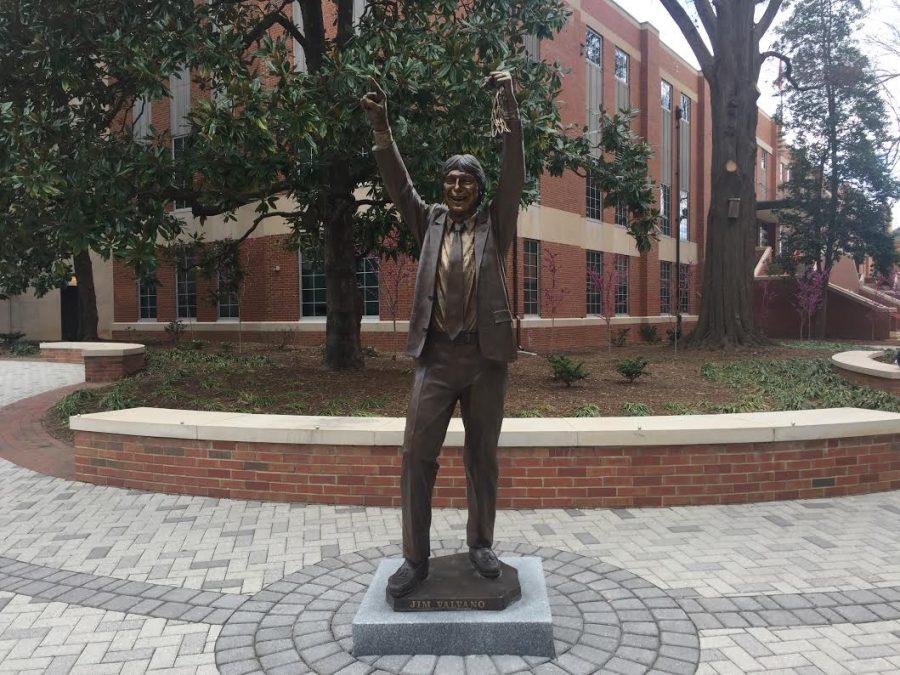 COACH JIM VALVANO, of the 1983 mens basketball national championship team, stands outside of Reynolds Coliseum.